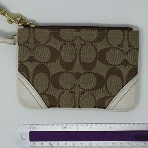 Coach wallet wristlet brown and white